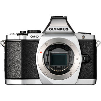 The Olympus is a gorgeous, old school throw back of a camera. It performs extremely well considering it's size. Tim Dodd Photography, Cedar Falls, Iowa reviews the Canon 60d along with the Sony A57 and the Olympus OM-D E-M5 Tim Dodd Photography, Cedar Falls, Iowa www.timdoddphotography.com
