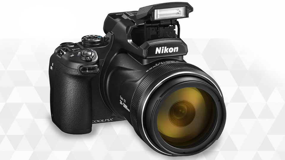 The superzoom name has been transferred from the SLR all-in-one zoom lens to bridge cameras, like the Nikon P1000.