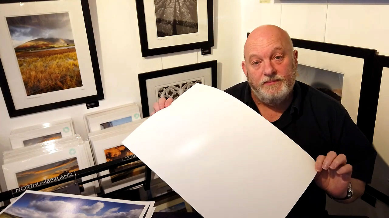 I think that you need to caption the images otherwise they have no relevance to the article (it is just a man holding up a piece of paper). Something like, ‘Canson Infinity Ambassador Chris Ceaser previews the new Baryta Prestige II