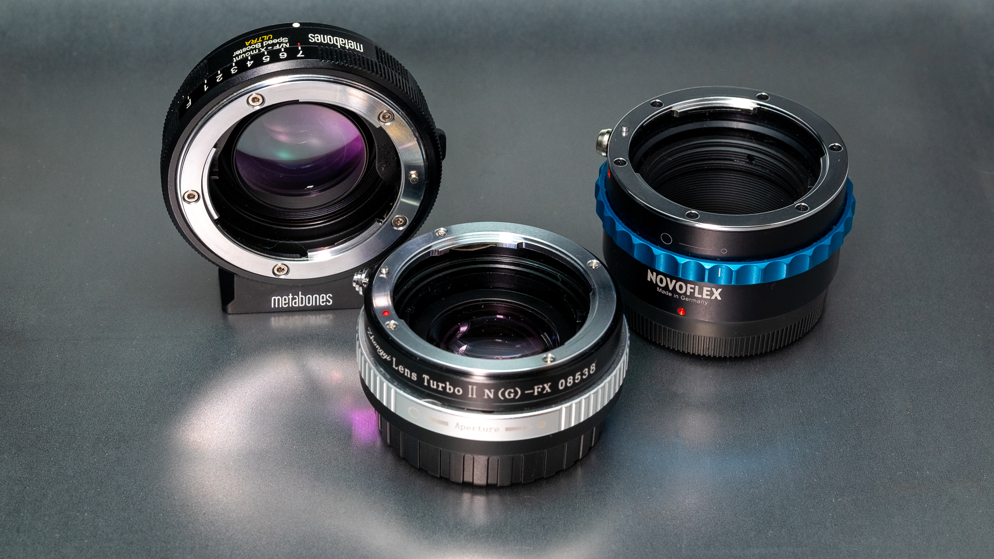 Two optical and one standard adapter for Nikon lenses on FUJIFILM X-series cameras