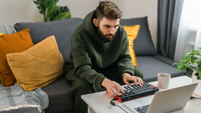 Student making music