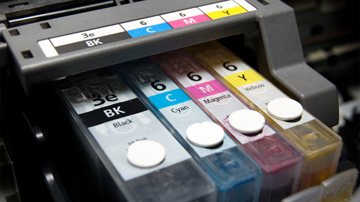 Close-up of color and black ink cartridges