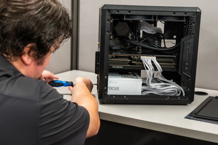 Securing the PSU to the PC case Securing the PSU to the PC case