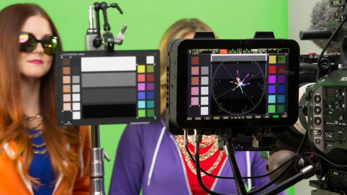 Production crew using color checker