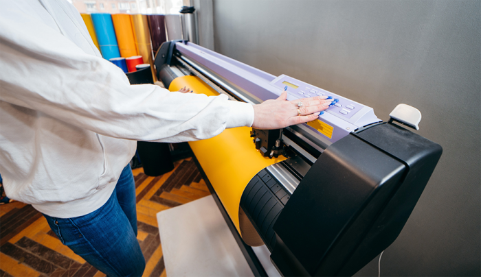 Large-format printer handling roll media