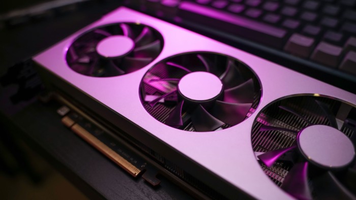 A graphics card with a triple-fan cooling system.