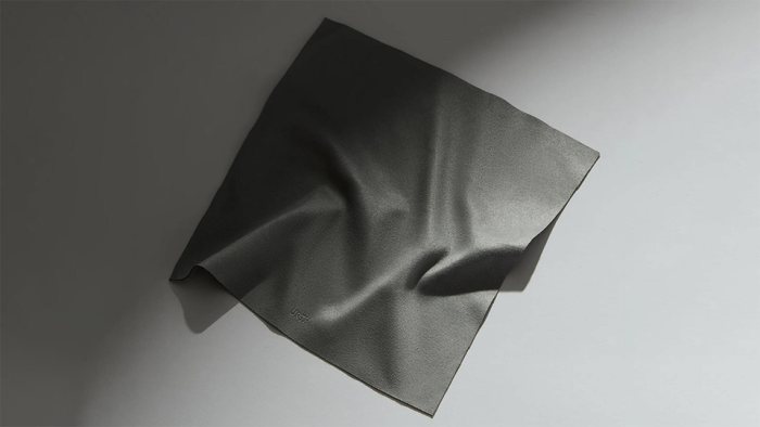 Gray lens cloth laying on a table