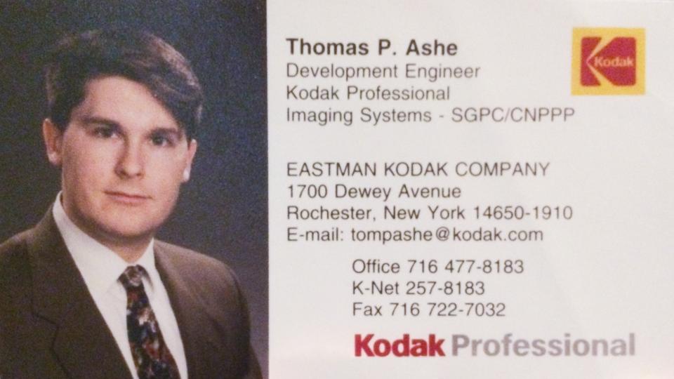 Portrait of Tom Ashe on his Kodak business card from the late 1990s.