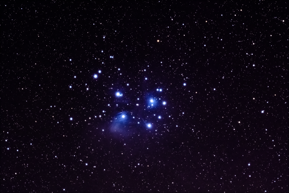The Pleiades star cluster, or Subaru, taken through a Meade 70mm astrograph. 10x magnification. The Pleiades star cluster, or Subaru, taken through a Meade 70mm astrograph. 10x magnification.
