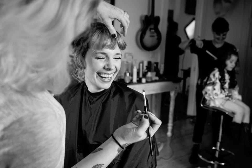 Courtney gets ready in her Jamaica Plain, Massachusetts, home. Rather than just taking beauty shots of the getting-ready process, McElwee aims to tell stories that go a little deeper and reveal more about her subjects' personalities, and their relationships with friends and family. She used a Sony 35mm f/1.4 lens to capture the whole scene, rather than just the bride.