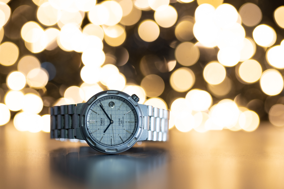 A 1980s vintage Timex Titanium Sport watch (this is the “dressier” version) was one of the first mass-produced titanium watches. Due to an incredible magazine ad featuring a broken watch (just the crystal) on a rail with the caption: “You should see what happened to the train,” it was a watch I always coveted as a youngster—a “grail watch.”