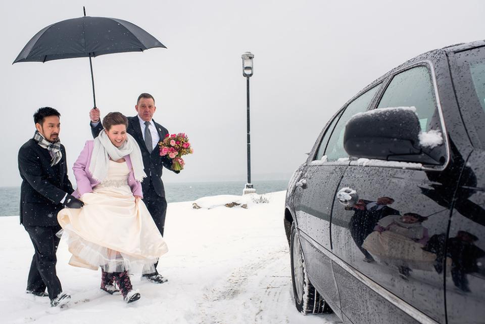 During a January Nor'easter in Portland, Maine, McElwee pulled out all the stops to tell the full story of her subjects, Kelly and Huy. “They braved the snow for portraits, but the above image better shows the challenge they faced in taking photos outside in such conditions,” she says. “Capturing transitional moments like this also creates a better story of the day for the album or slideshow, showing how the couple moved from one venue to the next.”
