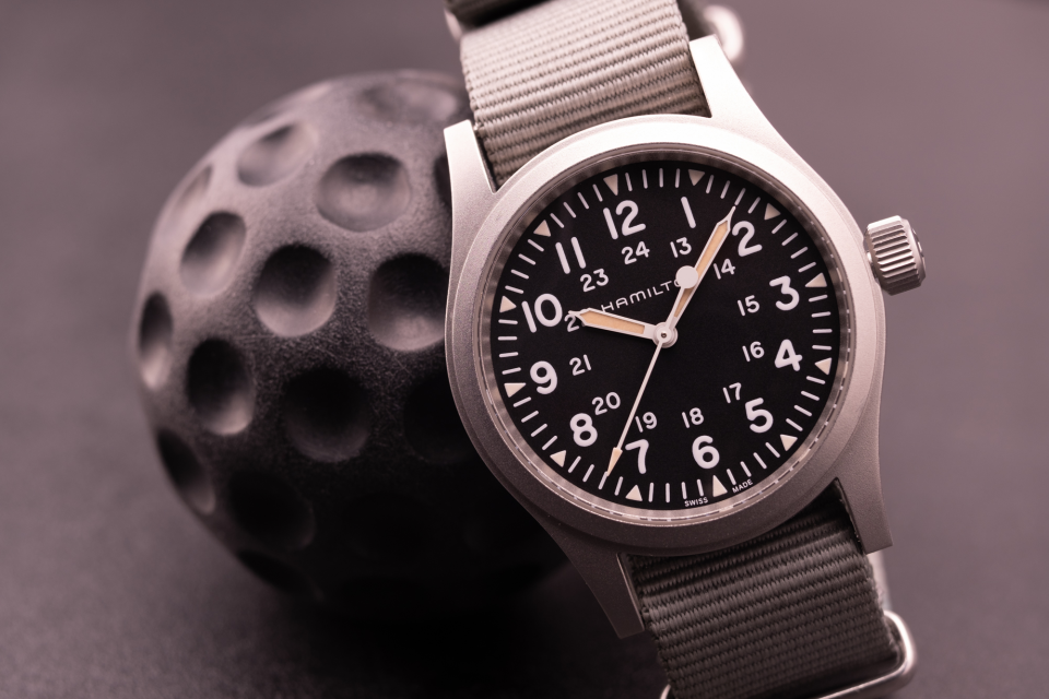 The Hamilton Khaki Field Mechanical H69439931with BluShark NATO Strap and a manual gear shift “golf ball” knob from a BMW race car.