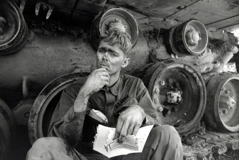 A solder with a letter from home. Lang Vei, Vietnam, 1971. ©2020 David Burnett/Contact Press Images