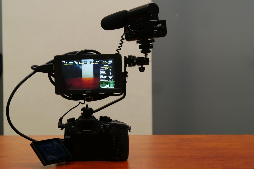 Mic mounted on bracket with small ball-joint head