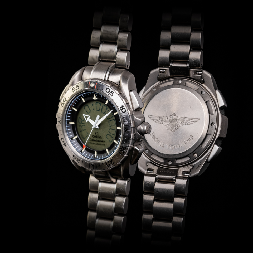 Here is a composite shot (with minimal skill demonstrated) of the front and back of my Omega Speedmaster Professional X-33 Ref 3291.50.00.