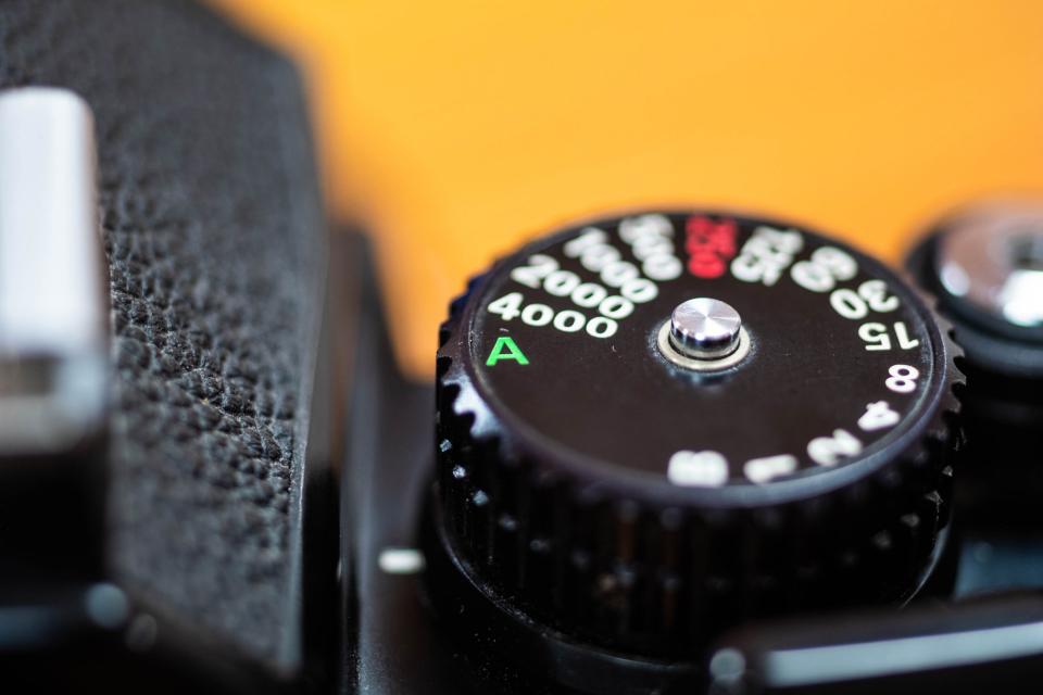 The green “A” on this Nikon FM3a’s shutter speed dial indicates an automatic exposure mode.