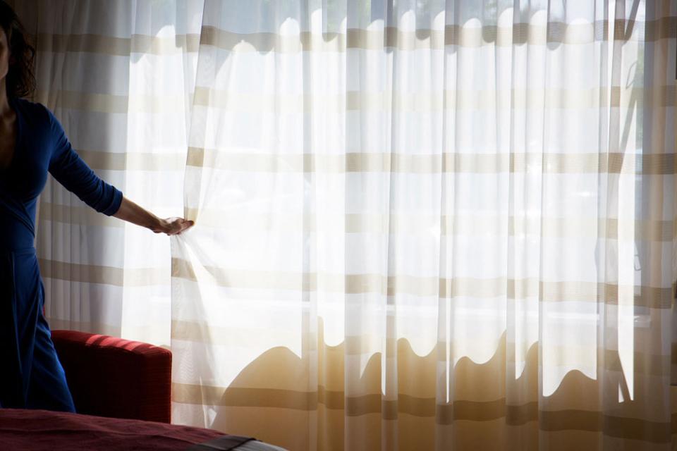 McClure made this early self-portrait with her Canon 5D and a wireless remote, seeking to convey the feeling of holding on to nothing.