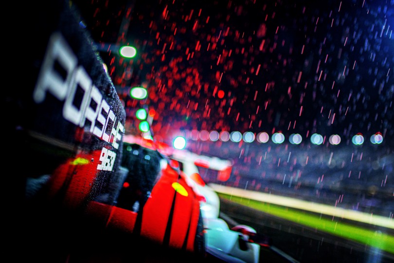 Various color temperatures from multiple light sources provide a wild array of colors during heavy rainfall in the Daytona pitlane. Nikon D5, ISO 640, 35 mm f/1.4 lens at 1/250.