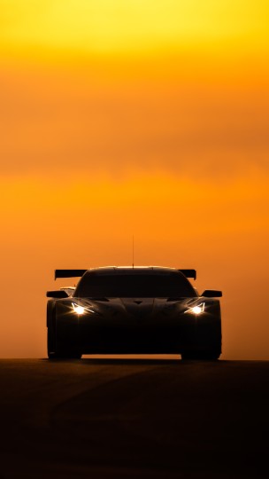 Corvette racing at sunset during the World Endurance Championship race at COTA, Austin, Texas. Nikon D5, ISO 50, 500 mm f/4 lens at 1/1600, Exposure compensation: -0.7.