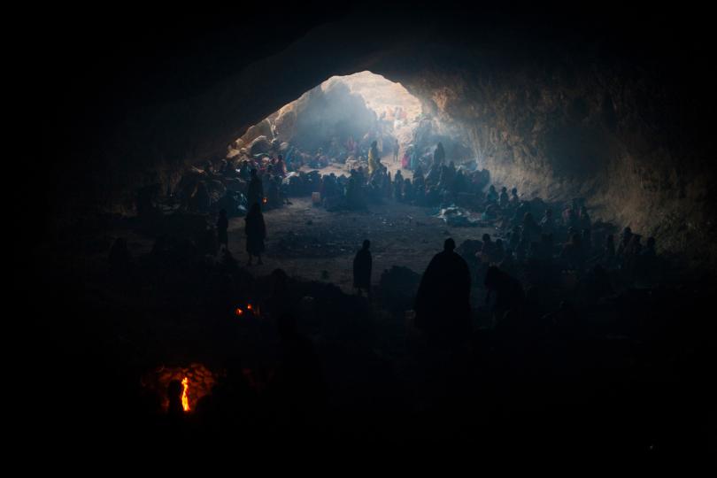 Hundreds of women and children who have fled the fighting and are seeking shelter from continued bombing by the Sudanese government's forces live in a cave, in Central Darfur, Sudan, March 2, 2015. Photograph © Adriane Ohanesian