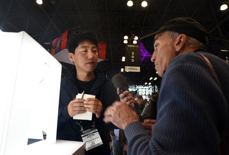 Justin Cho of OrangeMonkie speaks with Allan at PhotoPlus 2019