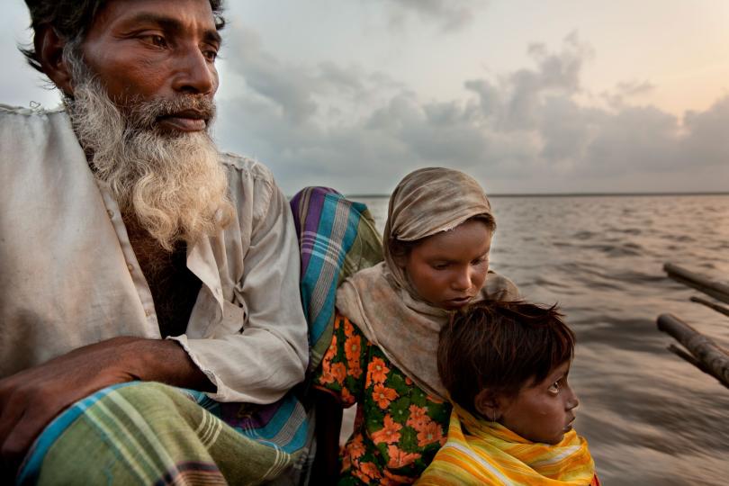 Climate Refugees; river crossing between Bondor Tila Ghat in Mijhum Dwip and Moktaria Bazar in Hatiya, Bangladesh, 2009 © Shahidul Alam, courtesy Drik/Majority World