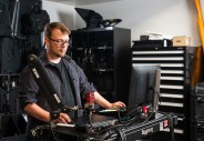 Peter at the mixing board on a Small Rig Video Production Camera cart.