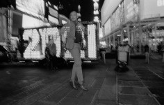 New Year’s Eve 2021 – New York, NY: Man Jumping into 2021 in Front of Date Marquee During COVID, Times Square