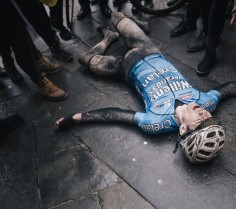 Exhausted Belgian cyclist Wout Van Aert (Veranda's Willems-Crelan) crashes to the ground after racing incredibly strong in his first Strade Bianche & finishing third, 12th Strade Bianche 2018, a one-day race from Siena to Siena, Italy. Nikon D500, 18-35mm, f/1.8