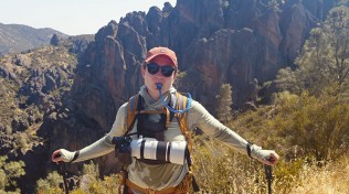Chelsea Mayer hiking with a Canon R5 C in search of California condors. Photo © Joel Wilson.
