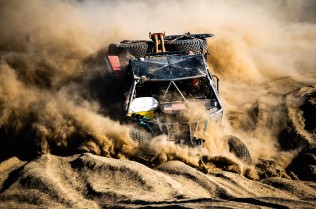 The offroad racing in Baja, Mexico is extremely rough, as evidenced by this Trophy truck missing most of its bodywork while engulfed in a deep silt bed. Nikon D5, ISO 160, 200 mm f/4 lens at 1/2000.