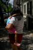 Mercedes poses for a portrait with her daughter down the street from her apartment building in the Washington Heights neighborhood of Manhattan, New York on June 19, 2020. Mercedes, who has no income since her husband lost his construction job due to the pandemic, is unable to receive unemployment benefits because of their immigration status. © Desiree Rios for The New York Times