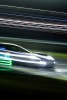 A technique called “whip panning” involves following a car using a very slow half-second shutter speed. Nikon D5, ISO 250, 105 mm f/10 lens at ½ second.