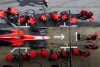 Pitstop practice is a ballet for mechanics in fire suits Everyone has a job to do and it’s fascinating to watch it unfold. Nikon D3s, ISO 100, 28 mm f/22 lens at 1/15, Exposure compensation: -0.7.
