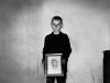 Freddy Childers: “Self-portrait with the picture of my biggest brother, Everett, who killed himself when he came back from Vietnam,” from “Portraits and Dreams” by Wendy Ewald. Courtesy the artist and MACK