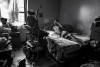 Malik and his wheelchair in his bedroom at the Mitchel Houses.