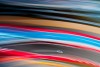 The observation tower and painted runoff areas at Circuit of the Americas make a great location for slow shutter speed panning shots. Nikon D3, ISO 100, 35 mm f/13 lens at 1/3 second.