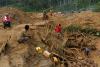 Men shovel and pump water at the Bemainty sapphire mining site, inside of the Ankeniheny - Zahamena Corridor (CAZ), a protected area in Madagascar. Beginning in 2015, when the sapphire rush was first underway, this section quickly became a threat to the rain forest’s flora and fauna, July 29, 2018. © Adriane Ohanesian
