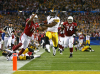 James Harrison of the Pittsburgh Steelers scores a touchdown against the Arizona Cardinals during Super Bowl XLIII. Photograph © Al Bello/Getty Images