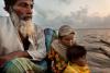 Climate Refugees; river crossing between Bondor Tila Ghat in Mijhum Dwip and Moktaria Bazar in Hatiya, Bangladesh, 2009 © Shahidul Alam, courtesy Drik/Majority World